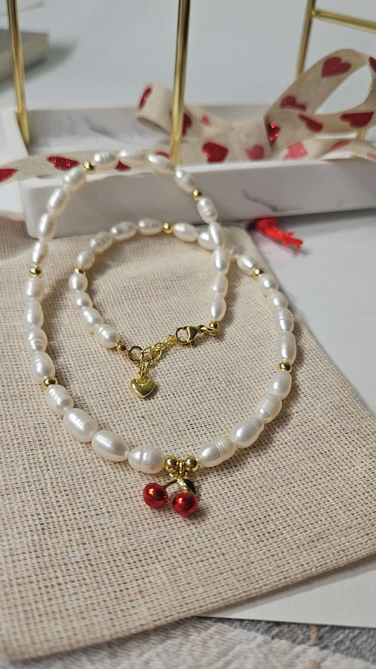 Pearl necklace with cherry